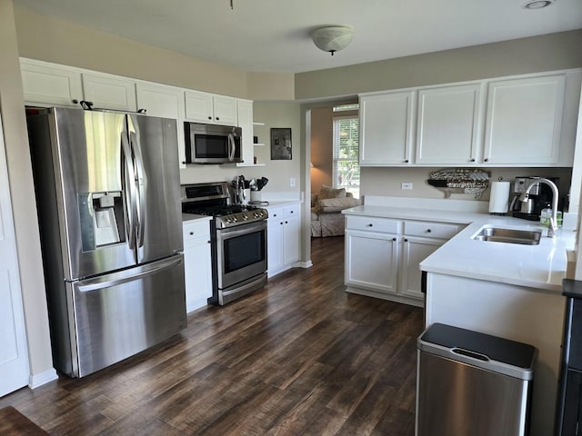1873 Baldwin Way, Bolingbrook, IL 60490 - kitchen featuring stainless steel appliances, light countertops, white cabinets, and dark wood-style floors