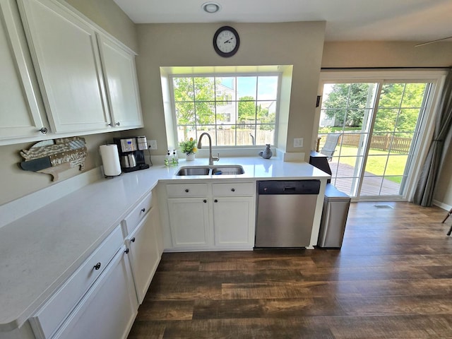 1873 Baldwin Way, Bolingbrook, IL 60490 - kitchen with dishwasher, light countertops, dark wood-style flooring, and white cabinetry