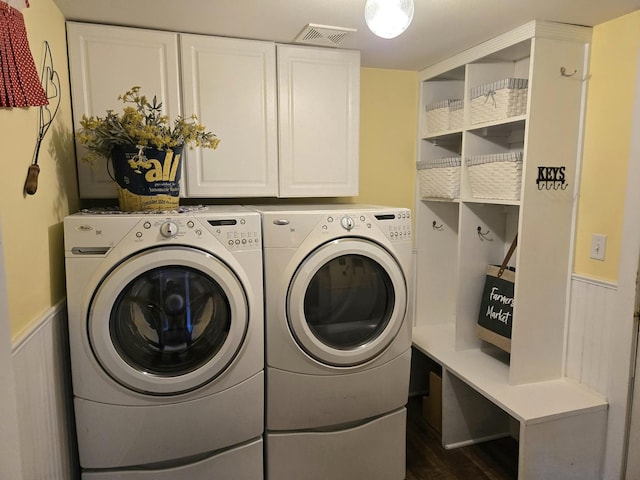 1873 Baldwin Way, Bolingbrook, IL 60490 - laundry area featuring separate washer and dryer, cabinet space, wainscoting, and dark wood finished floors