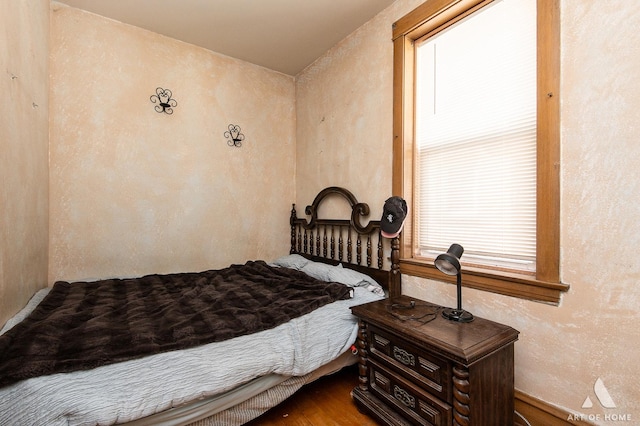 2339 S 61st Ave, Cicero, IL 60804 - bedroom with wood finished floors and a textured wall