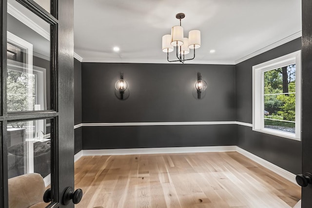 692 S Waukegan Rd, Lake Forest, IL 60045 - empty room featuring wood finished floors, ornamental molding, a chandelier, and recessed lighting