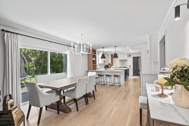 692 S Waukegan Rd, Lake Forest, IL 60045 - dining space featuring a chandelier, light wood-style floors, and recessed lighting