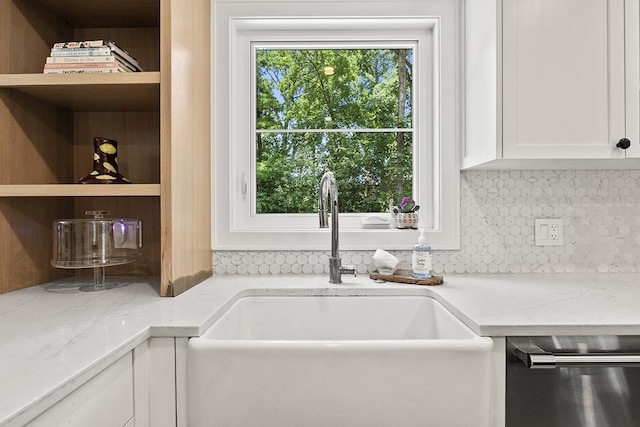 692 S Waukegan Rd, Lake Forest, IL 60045 - kitchen with dishwasher, tasteful backsplash, white cabinetry, and light stone countertops