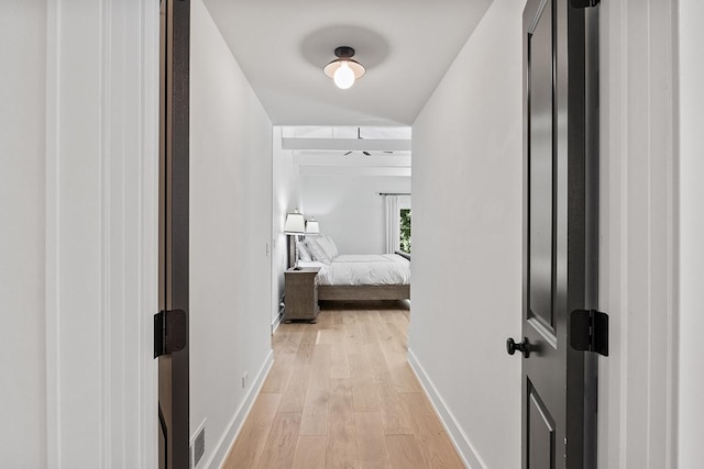 692 S Waukegan Rd, Lake Forest, IL 60045 - corridor with baseboards and light wood finished floors