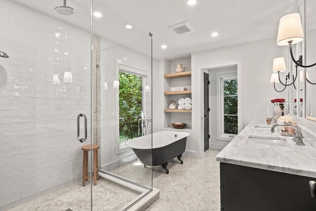 692 S Waukegan Rd, Lake Forest, IL 60045 - full bath with a shower stall, a freestanding tub, double vanity, and recessed lighting