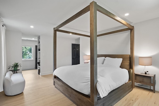 692 S Waukegan Rd, Lake Forest, IL 60045 - bedroom featuring light wood-type flooring and recessed lighting
