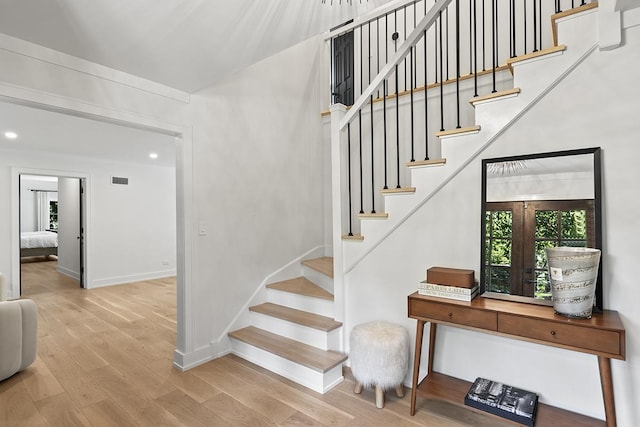 692 S Waukegan Rd, Lake Forest, IL 60045 - staircase featuring wood finished floors and recessed lighting