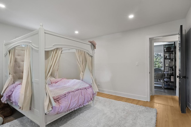 692 S Waukegan Rd, Lake Forest, IL 60045 - bedroom featuring light wood-style floors and recessed lighting