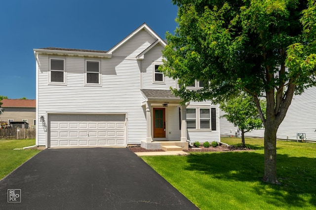 14530 General Dr, Plainfield, IL 60544 - traditional-style home featuring a garage and asphalt driveway