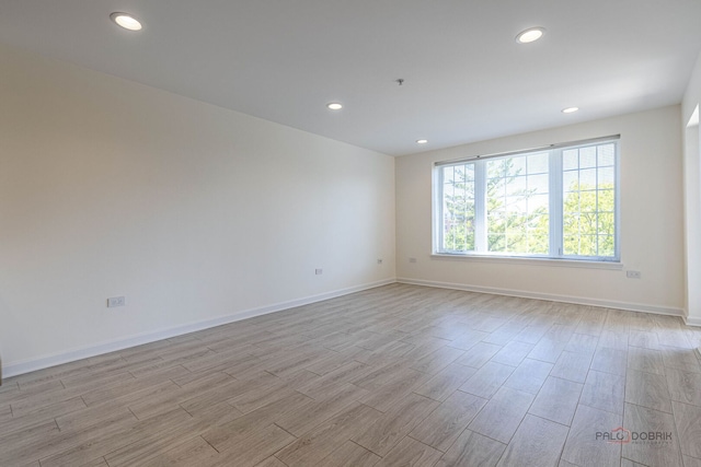 640 Robert York Ave Unit 306, Deerfield, IL 60015 - unfurnished room with light wood finished floors and recessed lighting