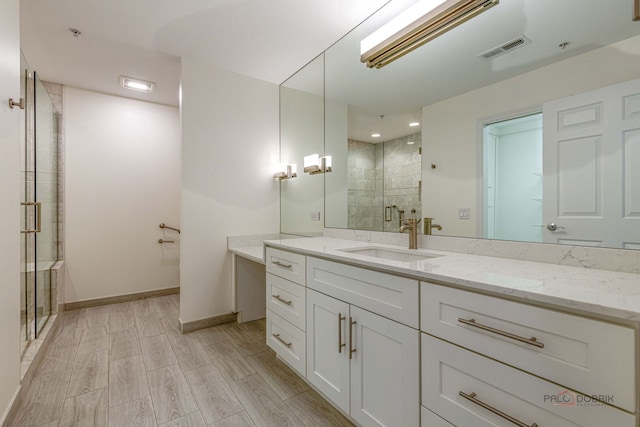 640 Robert York Ave Unit 306, Deerfield, IL 60015 - bathroom with a stall shower and vanity