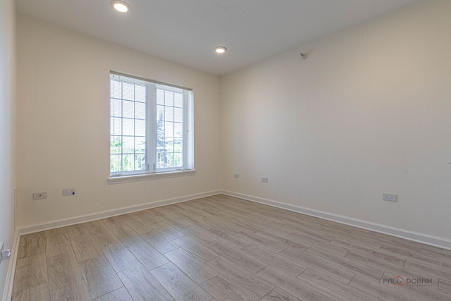 640 Robert York Ave Unit 306, Deerfield, IL 60015 - empty room featuring light wood-type flooring and recessed lighting