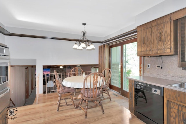 14332 S W Glen Dr, Homer Glen, IL 60491 - dining area featuring a chandelier and light wood finished floors