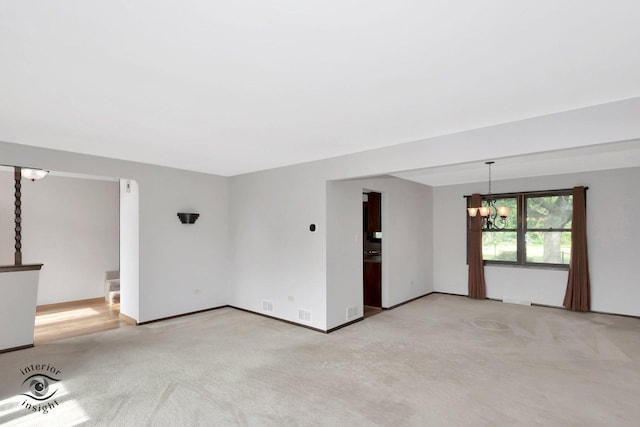 14332 S W Glen Dr, Homer Glen, IL 60491 - unfurnished room with light colored carpet and a chandelier