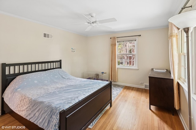 2340 Pomona Ln, Wilmette, IL 60091 - bedroom with light wood-style floors, crown molding, and ceiling fan
