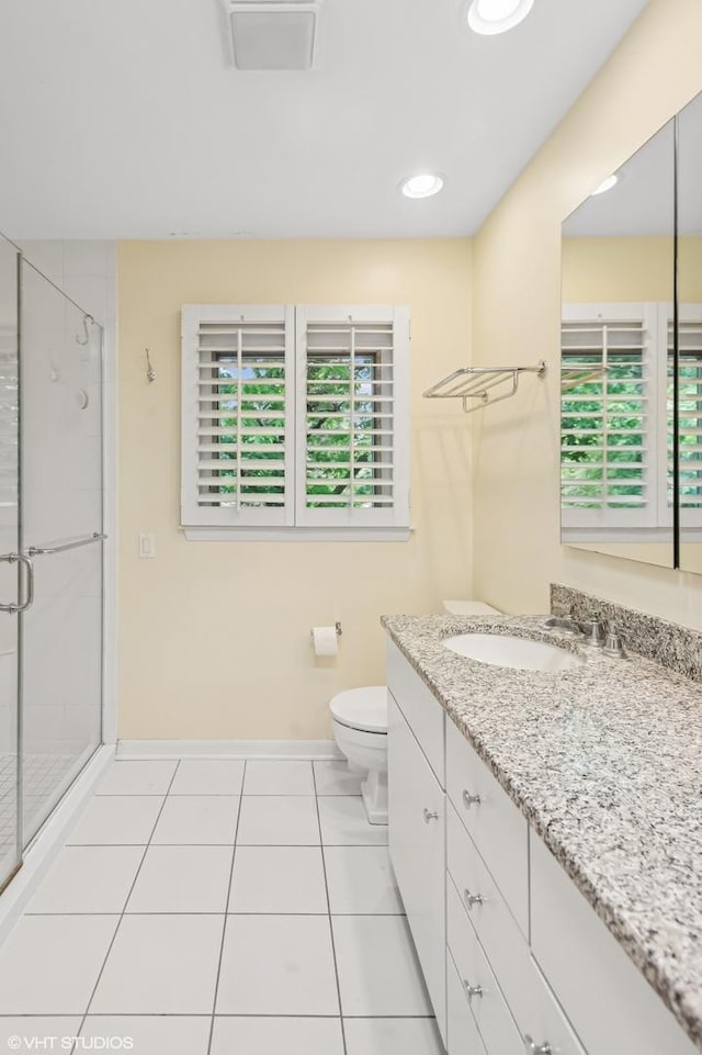 2340 Pomona Ln, Wilmette, IL 60091 - full bathroom featuring vanity, tile patterned flooring, and a stall shower