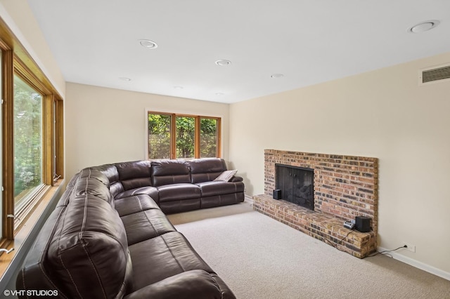 2340 Pomona Ln, Wilmette, IL 60091 - living room with carpet, a brick fireplace, and recessed lighting