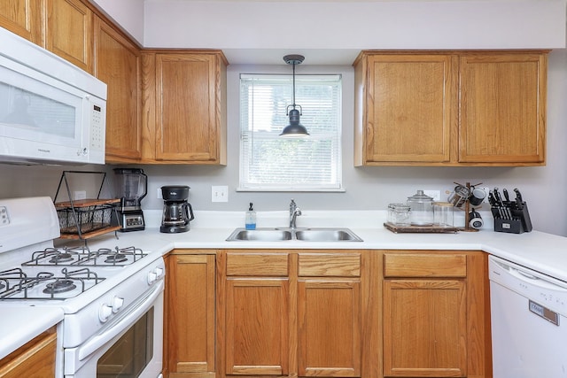 1769 Autumn Woods Ln, Romeoville, IL 60446 - kitchen with white appliances, light countertops, pendant lighting, and brown cabinetry