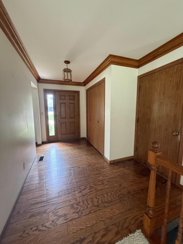 3030 Fairway Oaks Ln Unit 3030, Dekalb, IL 60115 - foyer with crown molding and wood finished floors