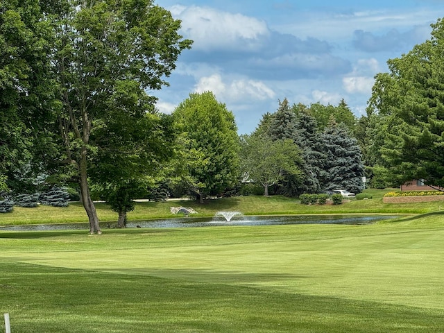 3030 Fairway Oaks Ln Unit 3030, Dekalb, IL 60115 - view of community with a water view, a lawn, and view of golf course