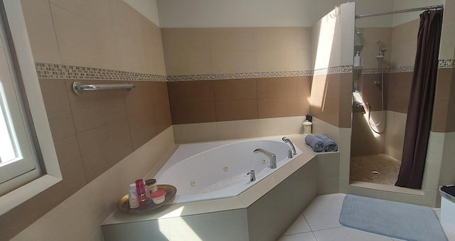 501 Hemlock Ln, Libertyville, IL 60048 - full bath with a stall shower, a whirlpool tub, tile walls, and tile patterned flooring