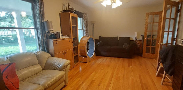 501 Hemlock Ln, Libertyville, IL 60048 - living room with light wood-style floors, a ceiling fan, and french doors
