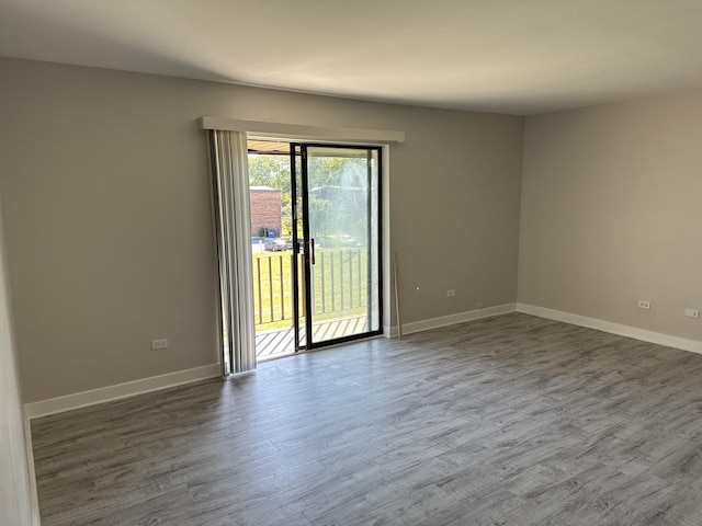 2237 175th St Unit 3A, Lansing, IL 60438 - empty room featuring baseboards and wood finished floors