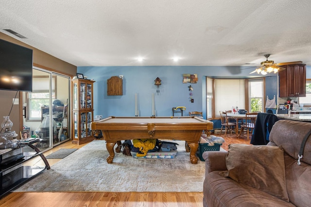 2612 Valkar Ln, Champaign, IL 61822 - playroom featuring a textured ceiling, billiards table, light wood-type flooring, and ceiling fan