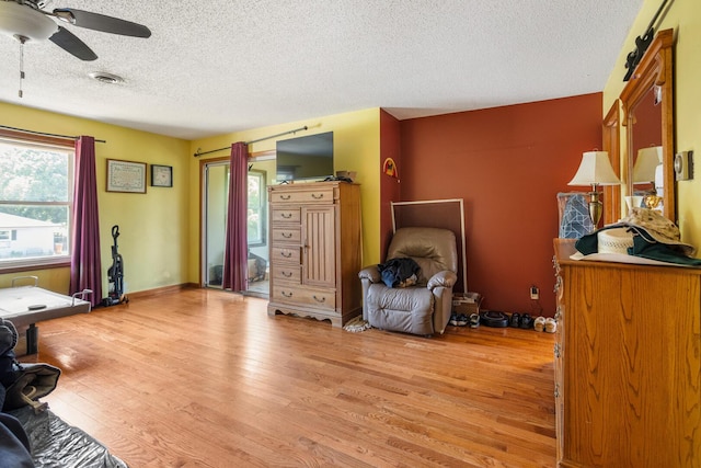 2612 Valkar Ln, Champaign, IL 61822 - sitting room with a textured ceiling, light wood-style flooring, and ceiling fan