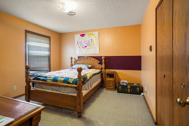 2612 Valkar Ln, Champaign, IL 61822 - carpeted bedroom featuring a textured ceiling and a closet