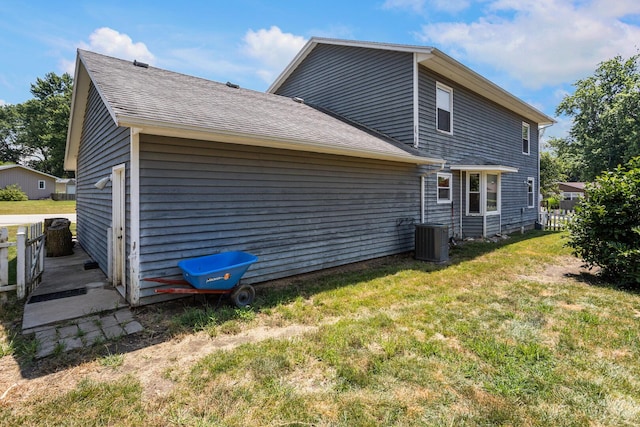 2612 Valkar Ln, Champaign, IL 61822 - back of property featuring a lawn