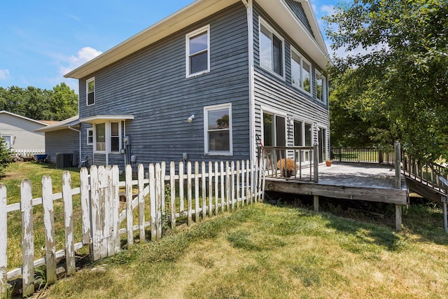 2612 Valkar Ln, Champaign, IL 61822 - rear view of house featuring a wooden deck