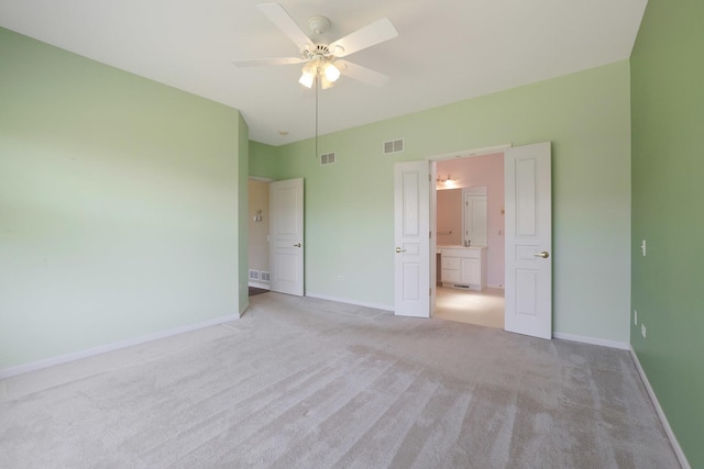 13245 Honeysuckle Dr, Huntley, IL 60142 - unfurnished bedroom with light carpet, ensuite bathroom, and ceiling fan