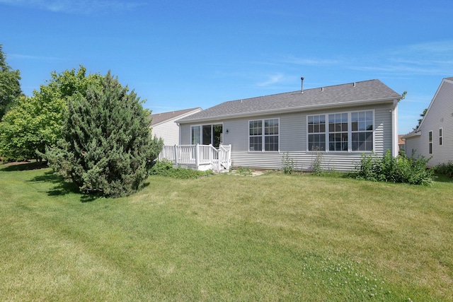 13245 Honeysuckle Dr, Huntley, IL 60142 - back of property with a wooden deck and a yard