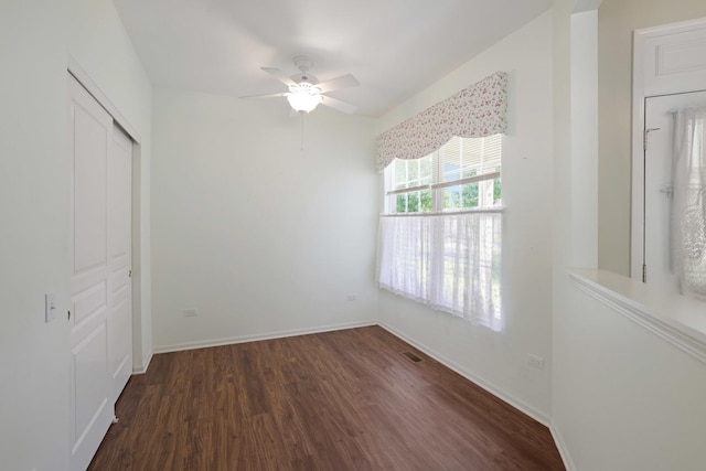 13245 Honeysuckle Dr, Huntley, IL 60142 - unfurnished bedroom with wood finished floors, a closet, and a ceiling fan