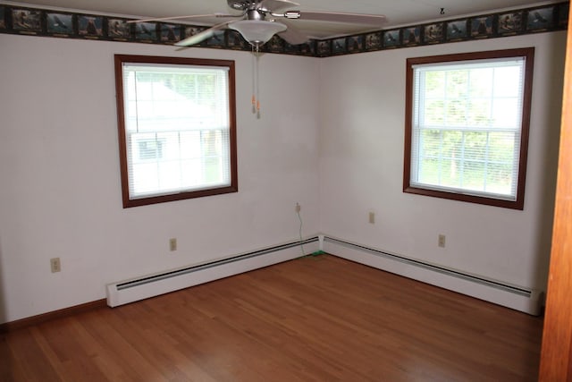 819 S W St, Earlville, IL 60518 - spare room with wood finished floors, plenty of natural light, and ceiling fan