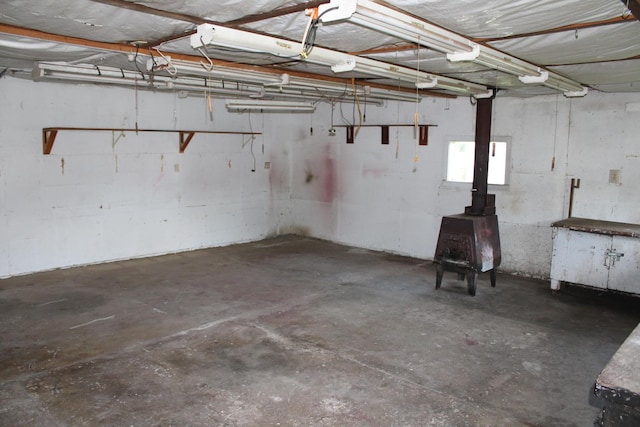 819 S W St, Earlville, IL 60518 - garage featuring a wood stove