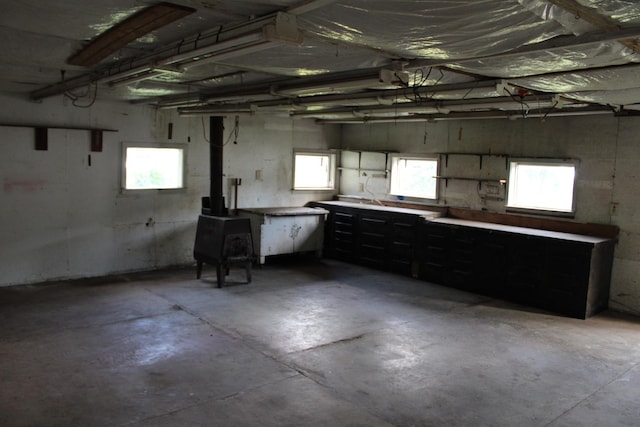 819 S W St, Earlville, IL 60518 - garage featuring a wood stove