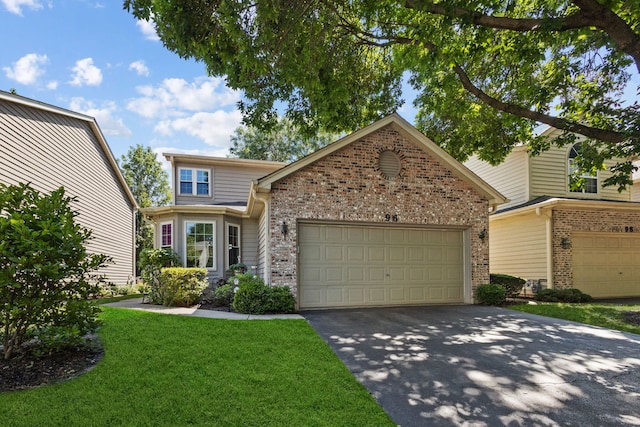 96 Townsend Cir, Naperville, IL 60565 - traditional home with driveway, brick siding, a front yard, and a garage