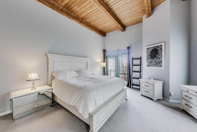 1740 N Marshfield Ave Unit 30, Chicago, IL 60622 - bedroom with a wooden ceiling with exposed beams, light carpet, access to outside, and high vaulted ceiling