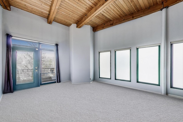 1740 N Marshfield Ave Unit 30, Chicago, IL 60622 - carpeted empty room with wood ceiling and baseboards