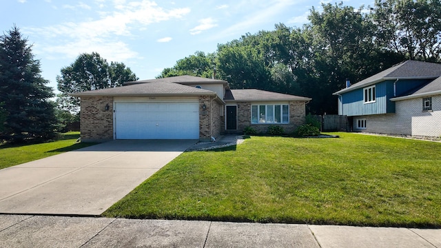 25601 Linden Ave, Monee, IL 60449 - view of front facade featuring an attached garage, concrete driveway, and brick siding