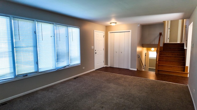 25601 Linden Ave, Monee, IL 60449 - foyer with dark colored carpet and baseboards