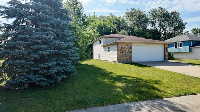 25601 Linden Ave, Monee, IL 60449 - view of front of house with a front yard, concrete driveway, a garage, and brick siding