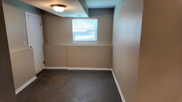 25601 Linden Ave, Monee, IL 60449 - spare room featuring unfinished concrete flooring and baseboards