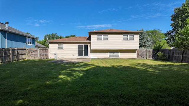 25601 Linden Ave, Monee, IL 60449 - back of house with a fenced backyard, a gate, and a patio