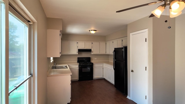 25601 Linden Ave, Monee, IL 60449 - kitchen featuring black appliances, exhaust hood, light countertops, ceiling fan, and white cabinets