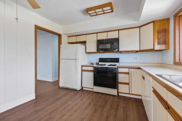 1165 Mayfield Ln, Hoffman Estates, IL 60169 - kitchen featuring white appliances, light countertops, dark wood-style floors, and ceiling fan