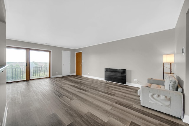 17824 Bernard Dr Unit 3D, Orland Park, IL 60467 - unfurnished living room with wood finished floors and baseboards