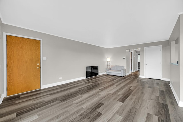 17824 Bernard Dr Unit 3D, Orland Park, IL 60467 - unfurnished living room featuring wood finished floors and crown molding